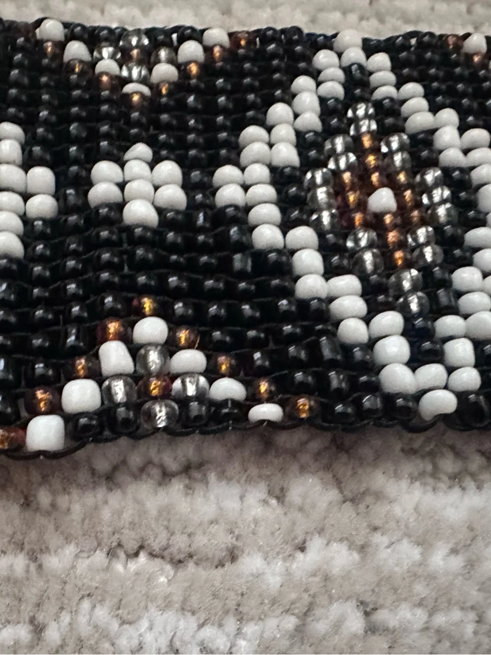 Express Black Beaded Belt with White and Brown Diamond Pattern